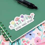 pray. wait. trust. sticker on notebook
