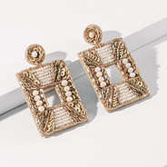 neutral gold statement earrings