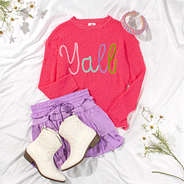 Styled Yall sweater with purple skirt and white cowboy boots