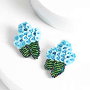 blue hydrangea earrings in studio