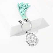 mint tassel key chain in studio