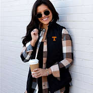 Brunette wearing Tennessee Puffer Vest
