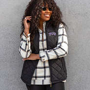 tcu puffer vest styled with plaid pullover leggings sunglasses