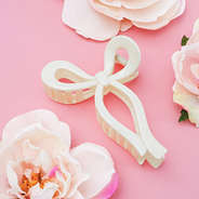 white bow hair clip with spring flowers