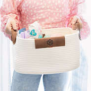 girl holding white personalized woven basket