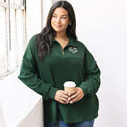 girl wearing pine monogrammed waffle knit pullover with jeans