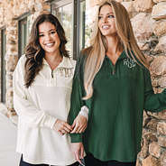 girls wearing ivory and pine monogrammed waffle knit pullovers