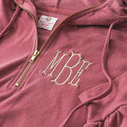 close up detail shot of monogrammed rose hoodie