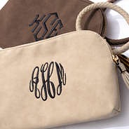 brown and taupe monogrammed wristlet clutch