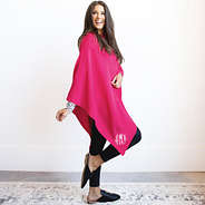 monogrammed hot pink poncho with black fur loafers