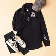 black faith pullover flatlay