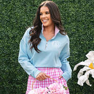 close up of monogrammed blue and pink seersucker faith pullover