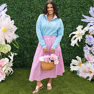 girl wearing monogrammed faith pullover in blue and pink seersucker with skirt