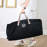 girl carrying monogrammed foldable storage bag