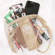 clear monogrammed wristlet with gameday football tickets