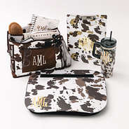 cowhide collection with bedside caddy clip board travel tumbler and lap desk
