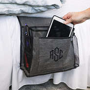 heathered grey bedside monogrammed caddy on bed