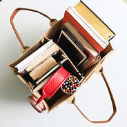 khaki home organizer with books