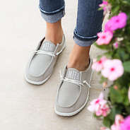 light gray slip on shoes with flowers