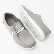 light gray canvas slip ons studio shot