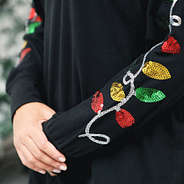 sequin christmas lights on monogrammed black sweatshirt