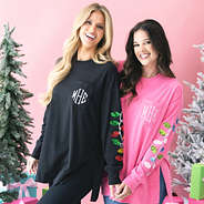 hot pink and black sweatshirts on two girls