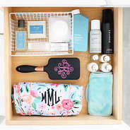 black hairbrush in drawer