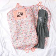 coral floral garment bag flatlay