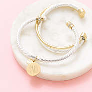 silver cable bracelet set on marble dish