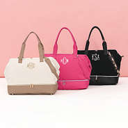 ivory hot pink and black monogrammed canvas weekenders