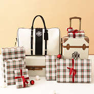 ivory/black weekender bag with suitcases