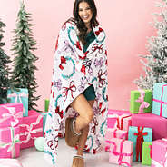 girl wrapped up in personalized merry bows plush blanket