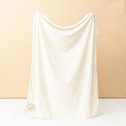 neutral herringbone plush blanket studio shot