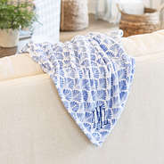 blue shells personalized plush blanket on couch