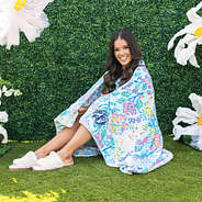 girl with personalized plush blanket in easter floral trellis