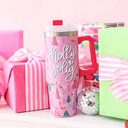pink christmas holly jolly tumbler with presents