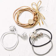 cute hair ties on vintage wood