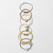 cute hair ties on vintage wood