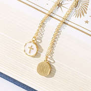 monogrammed reversible cross necklace front and back on bible