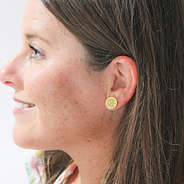 personalized disc western earrings in ear