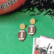 personalized football earrings on turf with pom pom