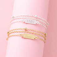 silver and gold multistrand bracelets together