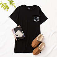 monogrammed sleep tee on white sheet with moccasins