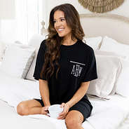 monogrammed sleep tee on Peyton sitting in bed