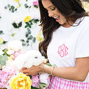 white short sleeve shirt flatlay on girl with bunny