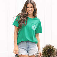 front of personalized golf tournament green shirt