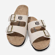 Monogrammed double strap sandals in tan
