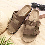 double strap sandals on sand
