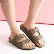 double strap sandals with pink background
