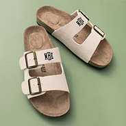 tan monogrammed double strap sandals